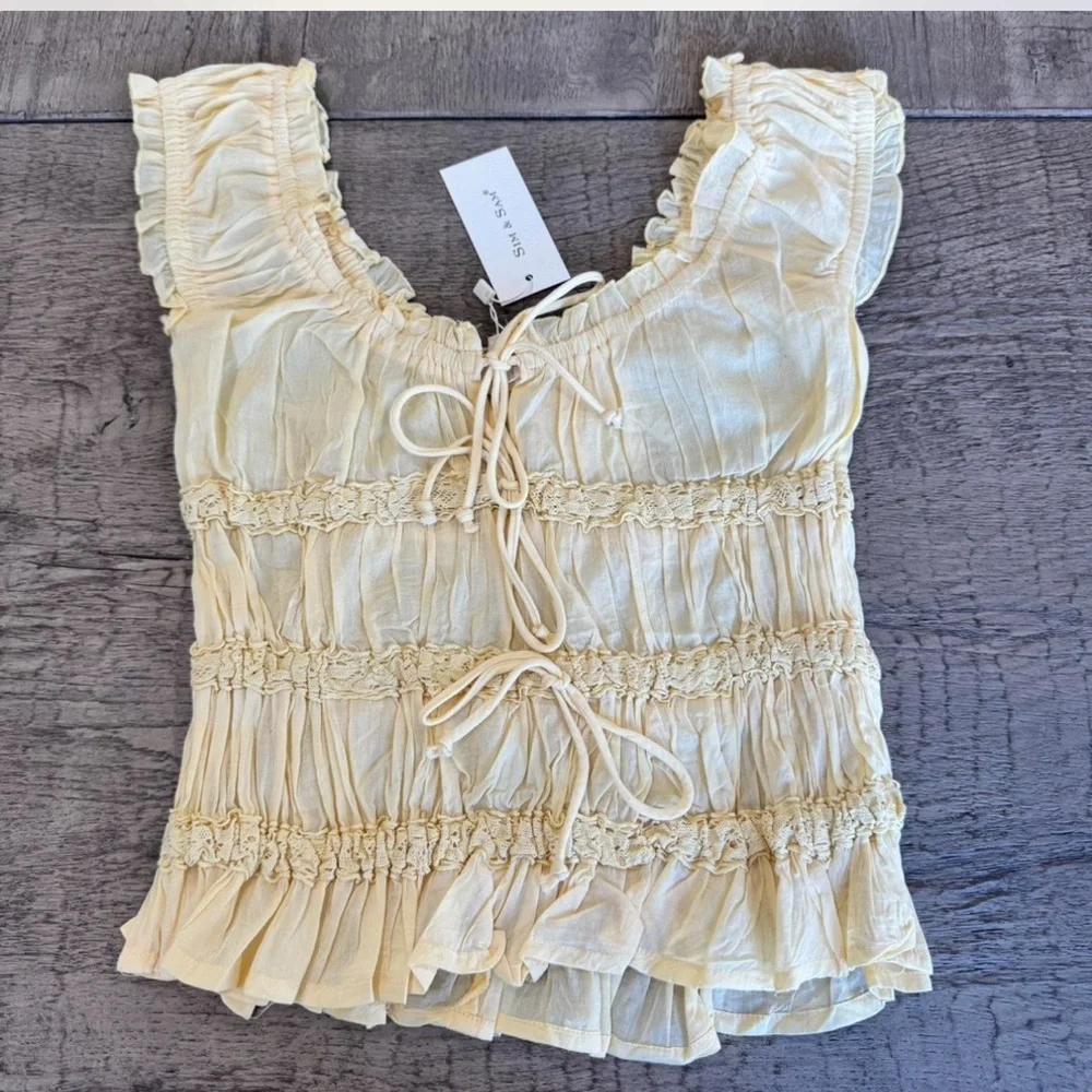 Sim & Sam Butter Yellow Tie Front Ruffle Lace Top
Small NWT Cottagecore - Picture 1 of 7